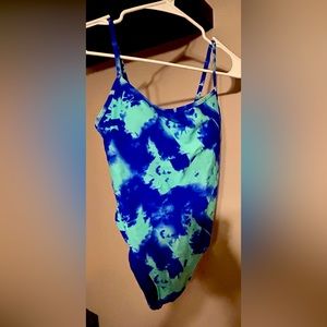 Brand new tied eyed one piece swimsuit .